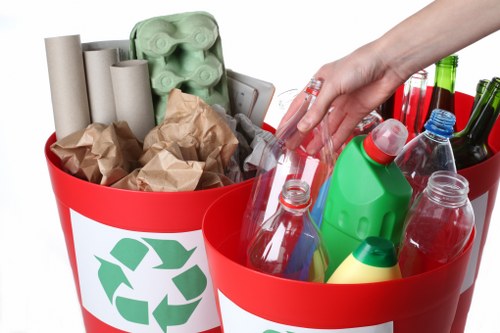 Workers managing builders waste in Bermondsey