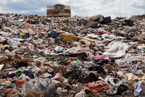 Workers segregating demolition waste on-site