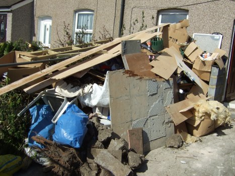 Secure enclosed skip ensuring waste protection from elements