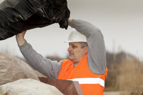 Professional waste disposal team handling hazardous materials